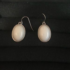 White dangly earrings